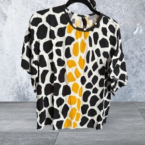 Conditions apply for Bl^nk London pullover top with back button NWOT